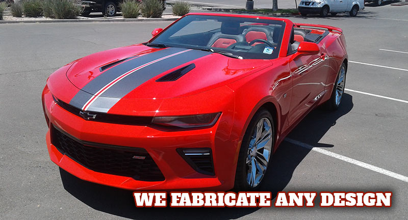 Red Camaro with black and white vinyl stripes.