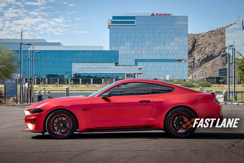 Vinyl wrap on a Mustang in red, Matte Chrome finish.