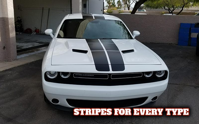 White Dodge Challenger with black vinyl stripes in Scottsdale AZ