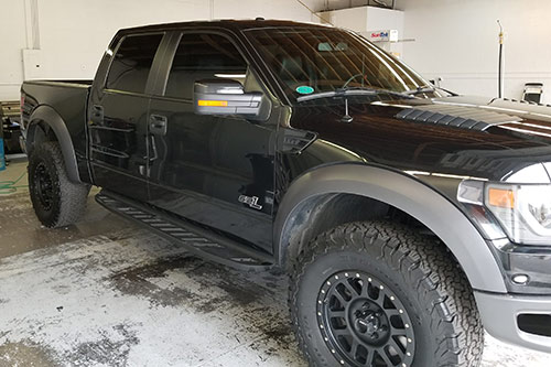 Black Ford Raptor SVT in for truck window tint.