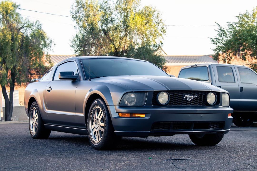 Mustang in matte charcoal metallic with black stripes