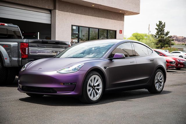 KPMF Purple/Black Iridescent on Tesla from the side.