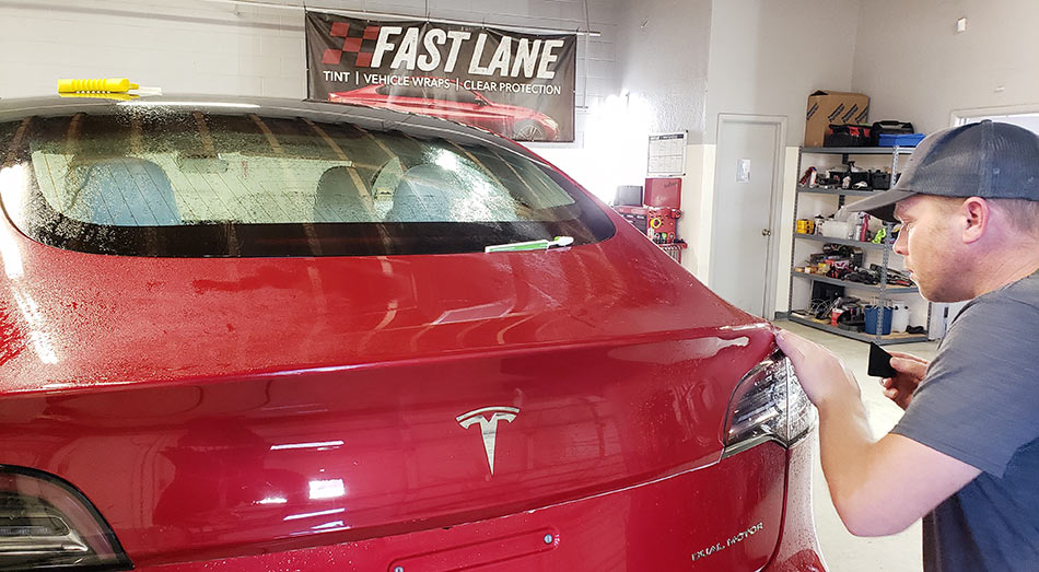 Tesla Model 3 in for full-body paint protection film.