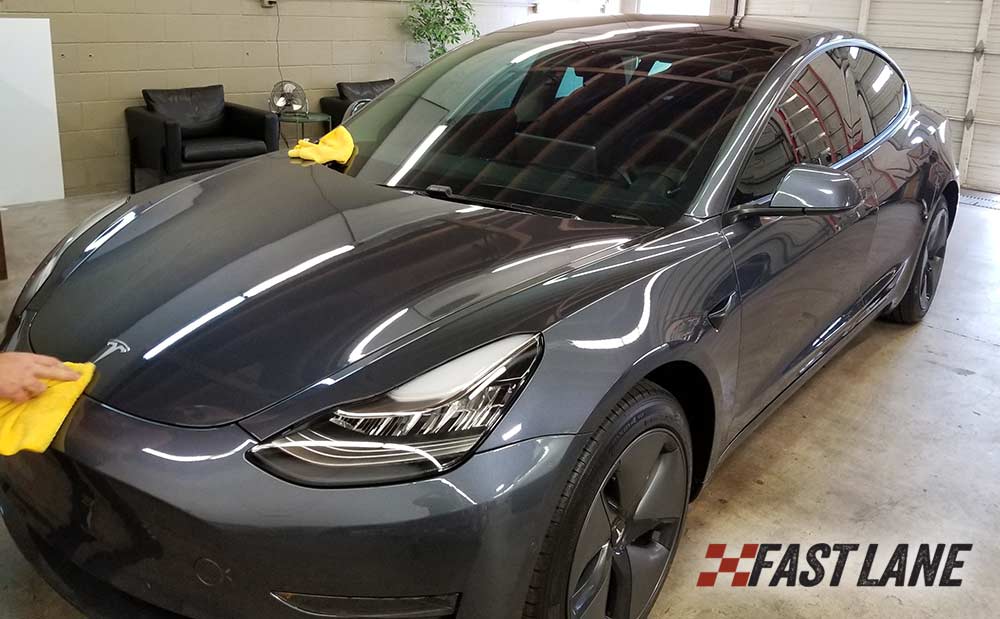 Full front clip paint protection film on a Tesla Model 3.