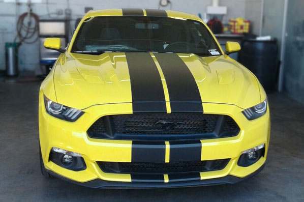 Yellow Ford Mustang with black vinyl stripes in Scottsdale AZ